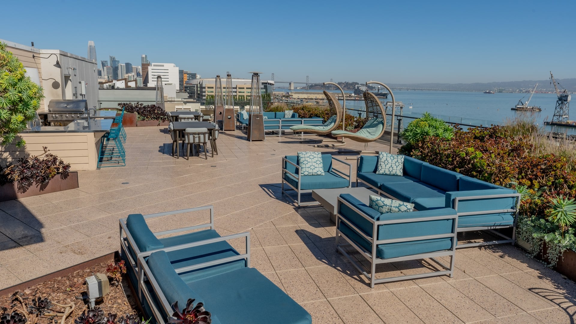 Dogpatch Apartments for Rent - Potrero Launch - Sky Lounge with Patio Furniture, BBQ’s, and Views of the Bay.
