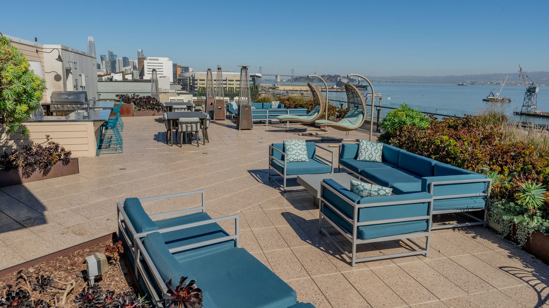 Apartments for Rent Dogpatch- Skylounge Spa With Lounge Chairs and Stunning View of San Francisco Skyline